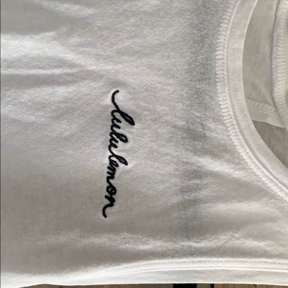 Like new Lululemon top white with front Lululemon